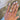 A close-up of a hand wearing a radiant lab grown diamond engagement ring. Custom engagement rings San Diego, CA