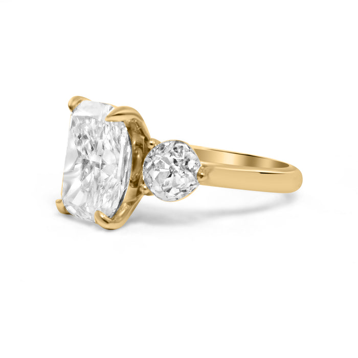 Krista | Three Stone Elongated Cushion Round Moissanite Shank Accent stone 14k Yellow Gold Engagement Ring - Diamond Daughters, Side View