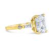 Alexis | Emerald Moissanite Baguette And Round Accent Stone 14K Yellow Gold Engagement Ring - Diamond Daughters, Side View