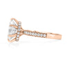 Henna | Oval Hidden Halo Moissanite 14k Rose Gold Engagement Ring - Diamond Daughters, Side View