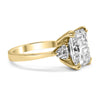 Jessica | Radiant Moissanite Two Trillion accent stones 14K Yellow Gold Engagement Ring - Diamond Daughters, Side VIew