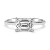 Maci | East West Emerald Cut Solitaire 14K White Gold Engagement Ring - Diamond Daughters, Front View