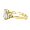 Megan | Emerald Moissanite Four Accent Stones 14K Yellow Gold  Engagement Ring - Diamond Daughters, Side View