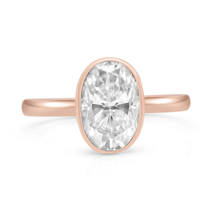 Melissa Oval | Moissanite  Bezeled Solitaire 14K Rose Gold Engagement Ring - Diamond Daughters, Front View