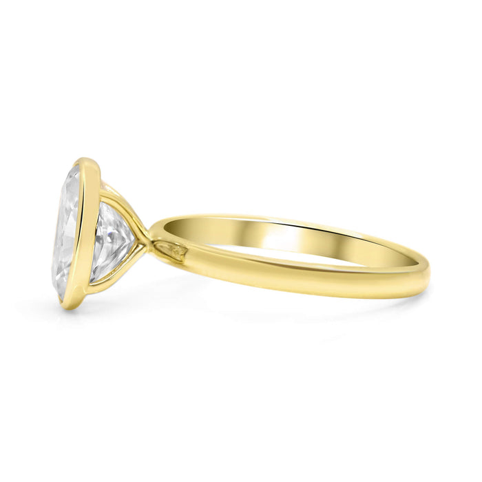 Melissa Oval | Moissanite Bezeled Solitaire 14K Yellow Gold Engagement Ring - Diamond Daughters, Side View