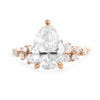 Stacey | Pear Moissanite Shank Accent Diamonds 14K Rose Gold Engagement Ring - Diamond Daughters, Front View